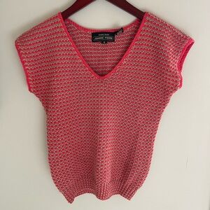 Short sleeved sweater. Color: tan and salmon. Size small.
